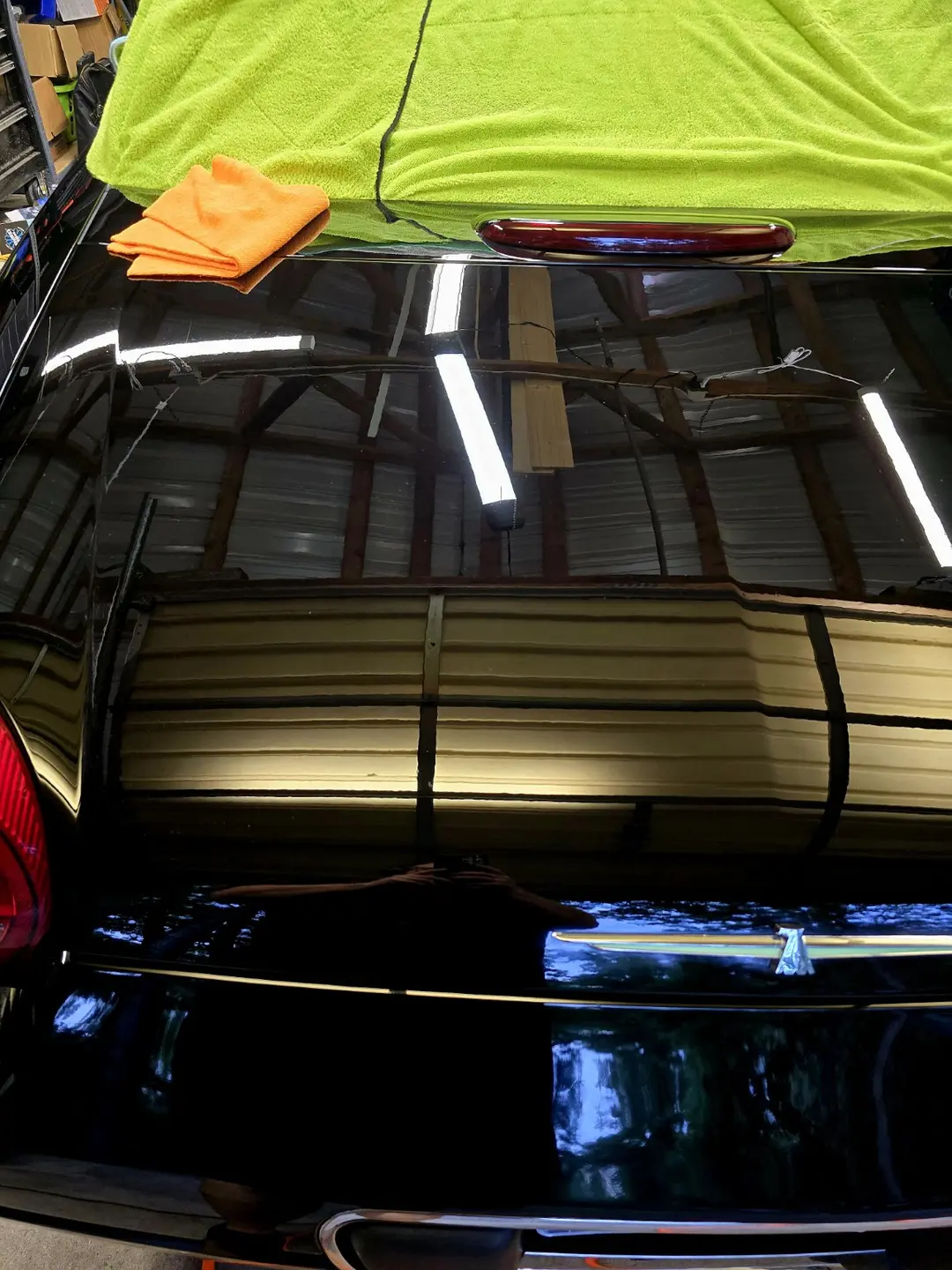Clear, deep reflection on the black Thunderbird after paint correction