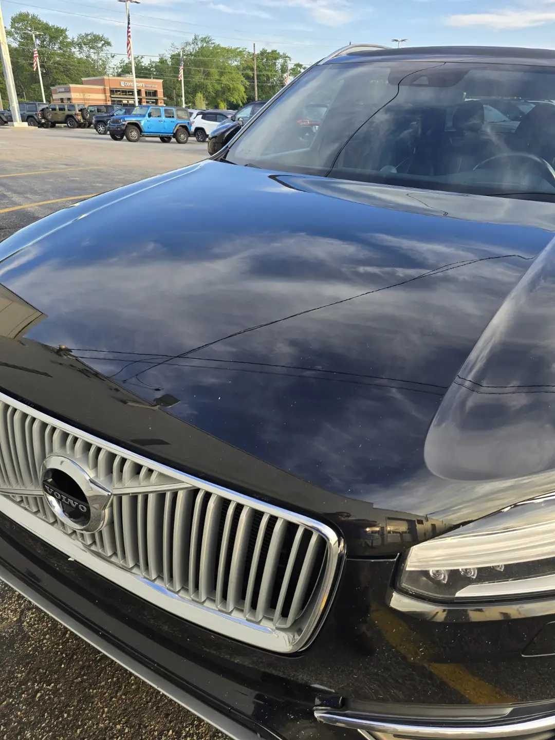 Refined metallic Volvo XC90 hood after two-stage paint correction